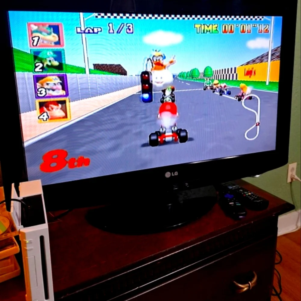 Nintendo Wii Console with White Console and Black TV Display